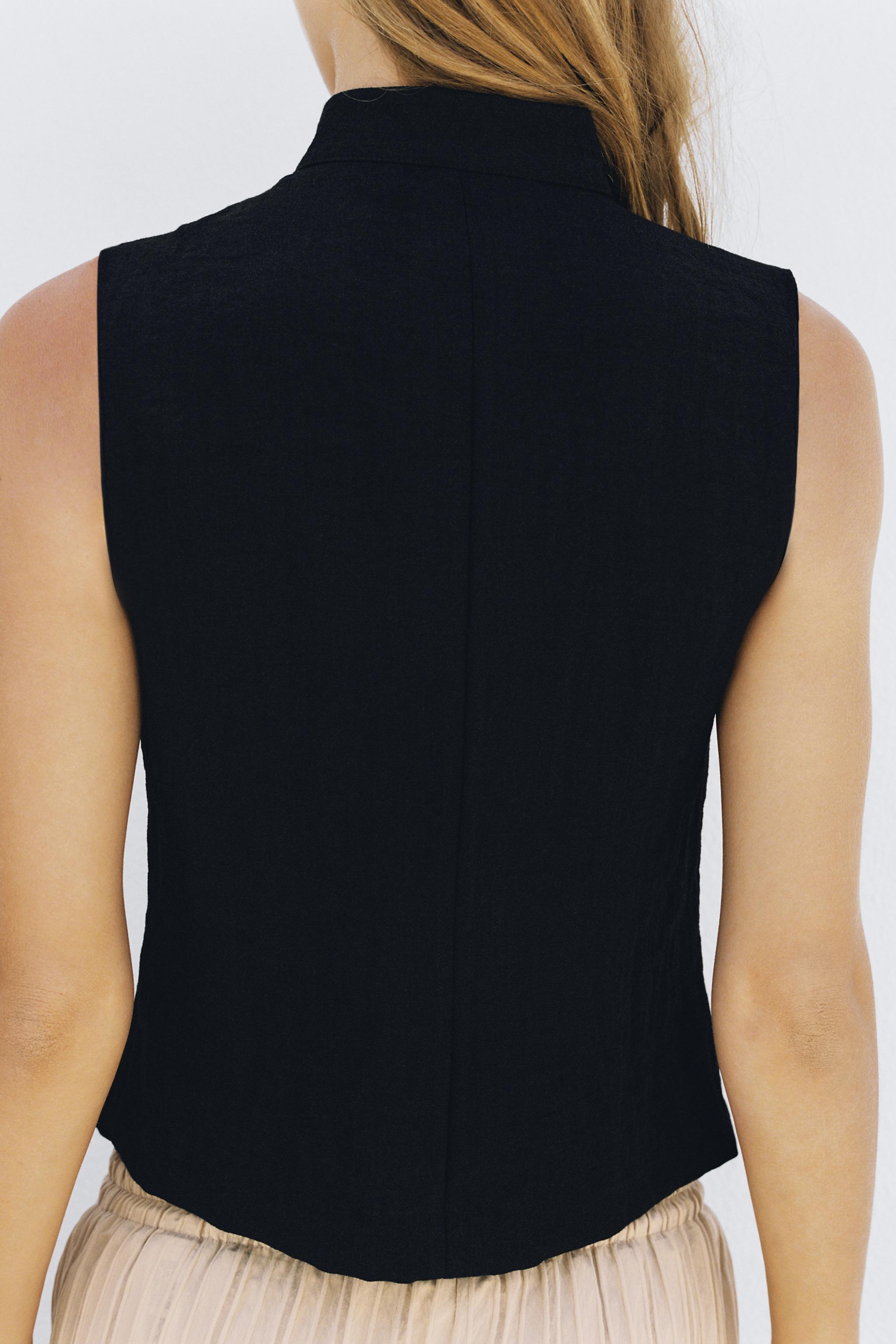 SLEEVELESS BUTTON SHIRT